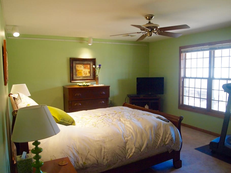 Lovely well appointed second bedroom with view of lake and TV
