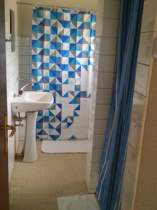 View from private bathroom entrance. Has both tub and shower