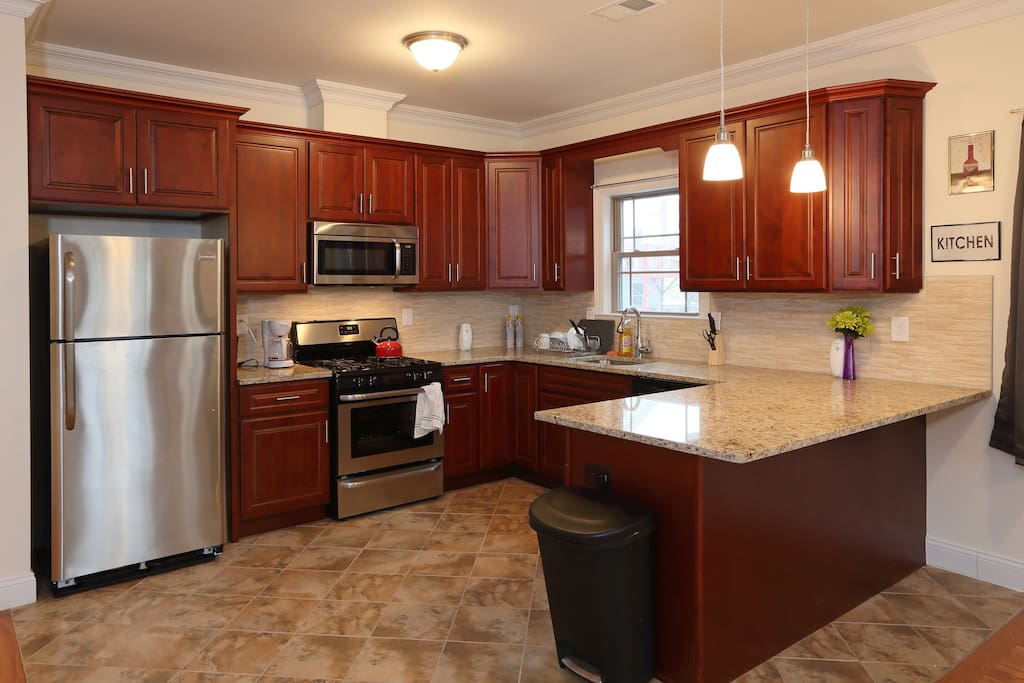 The kitchen contains a microwave, coffeemaker, dishwasher, plates, pots and pans -- everything you might need.