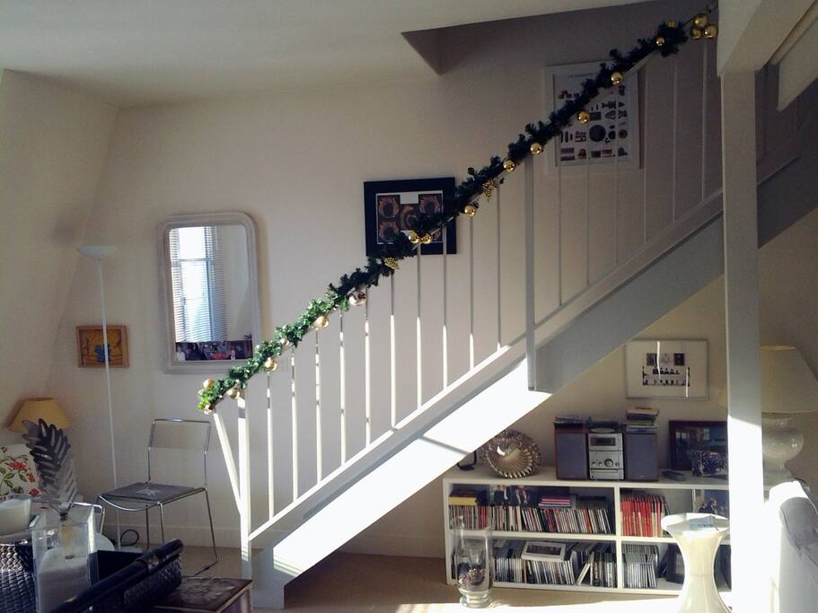 Living room with stairs to the upper floor