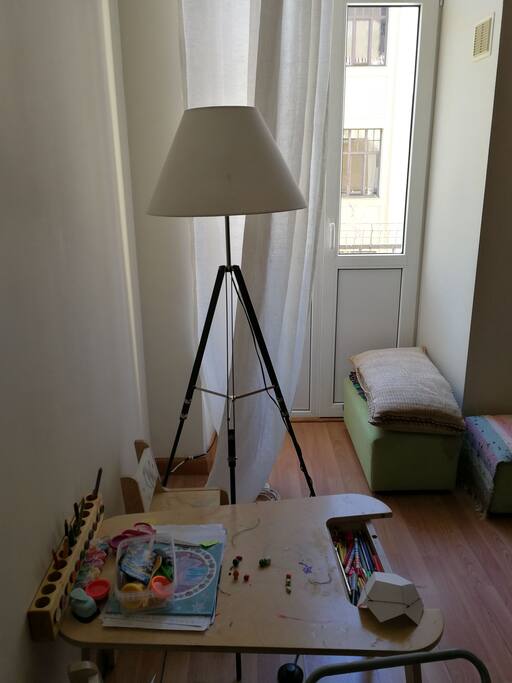 One of the doors to the terrace and the kids painting table