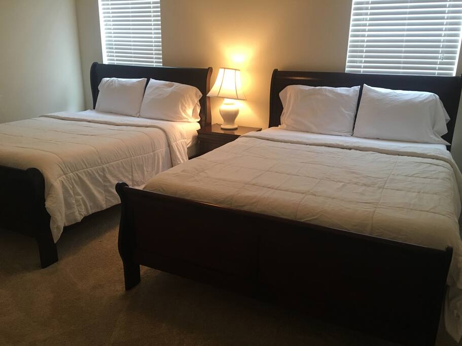 Two queen beds in the master bedroom