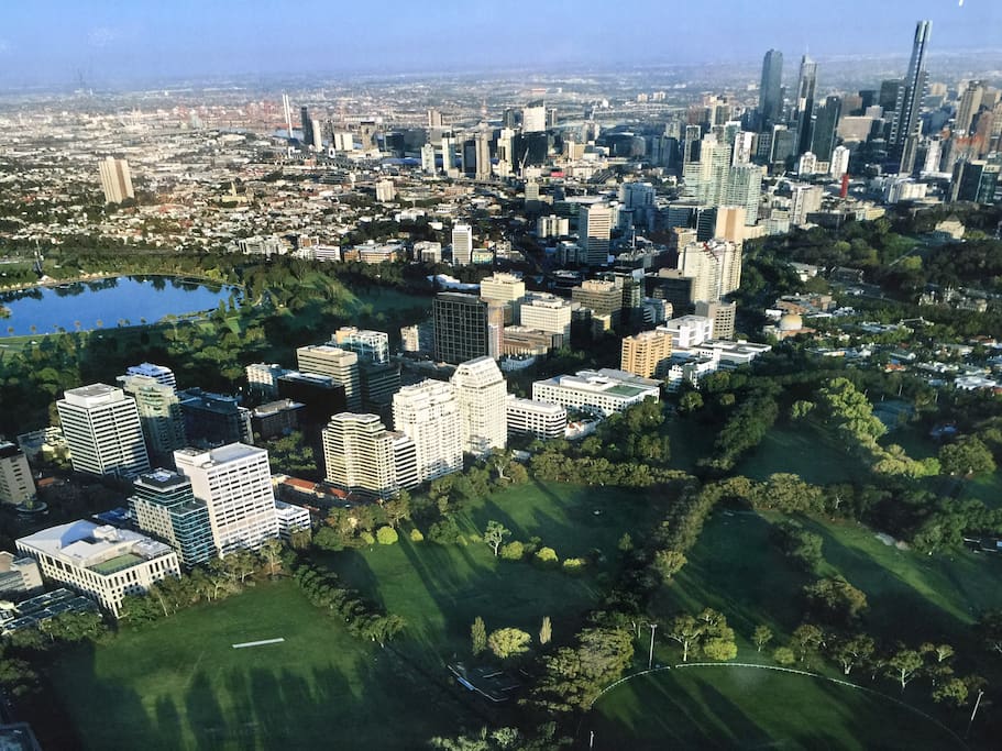 Your building is in centre of this view of parks, lake, boulevard and CBD