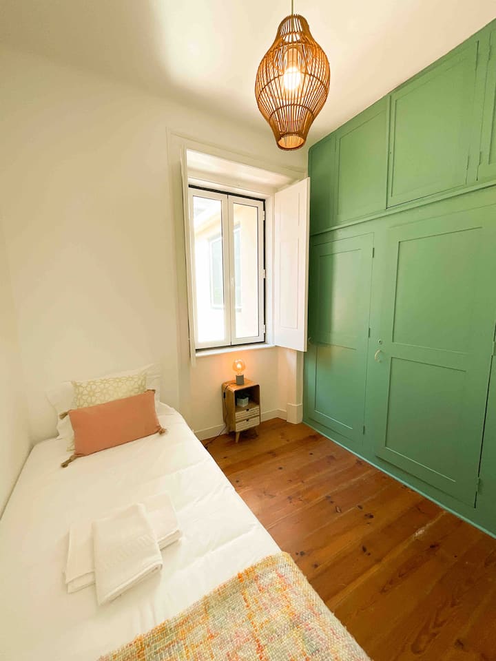 Slaapkamer III met een eenpersoonsbed.