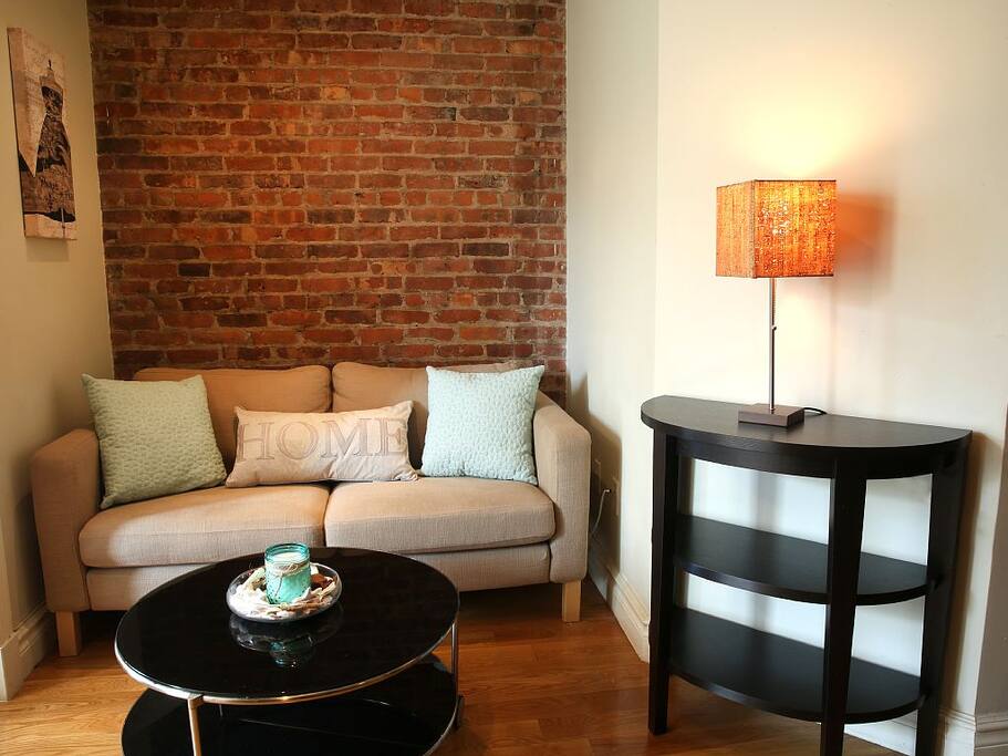 Lounge on the sofa while enjoying your favorite shows or movies on the flatscreen TV