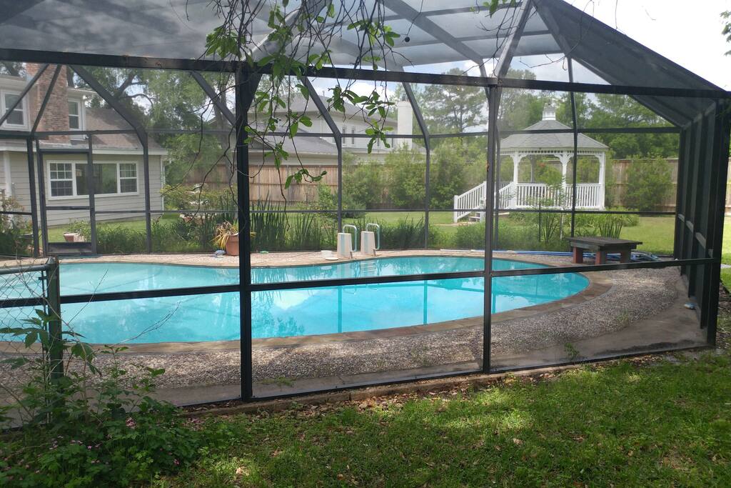 Screened-in pool and hot tub
