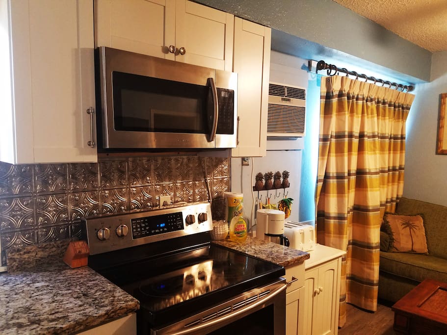 remodeled kitchen features all stainless appliances
