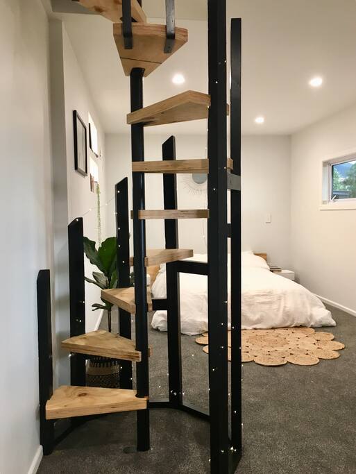 Staircase goes up to the hallway