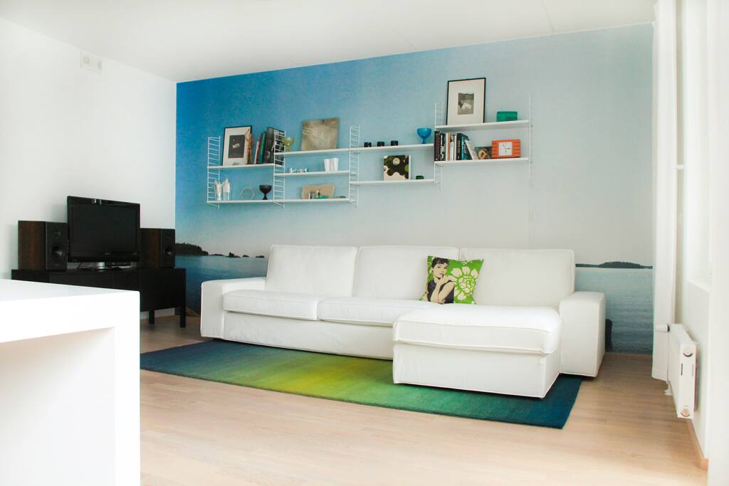 A spacious living room combined with the kitchen.
