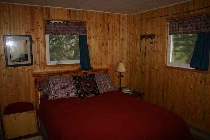 View of the bedroom from the doorway into it.