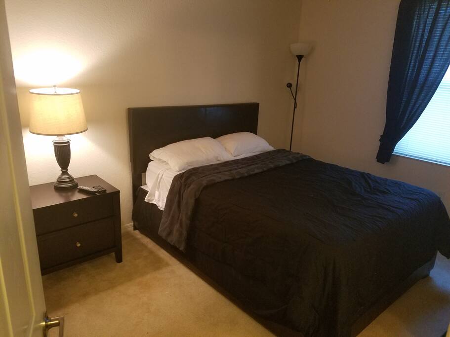 2nd Guest Bedroom - Queen Size Bed with view of pool area