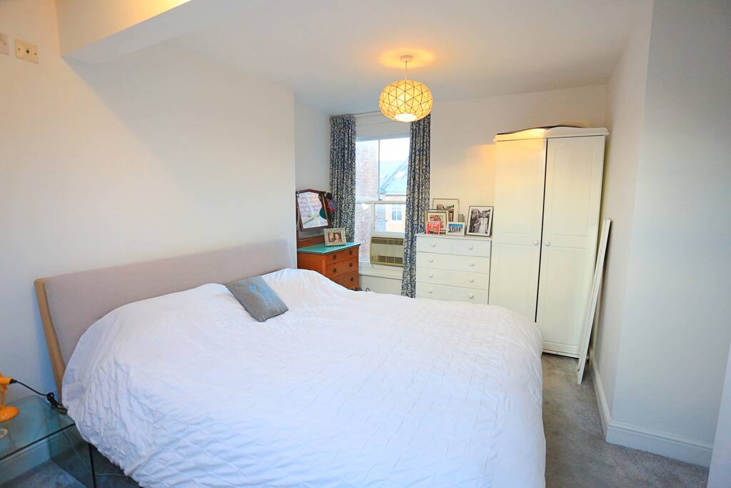 Loft bedroom with super kingsized and en suite bathroom. Plenty of room for a child's travel cot.