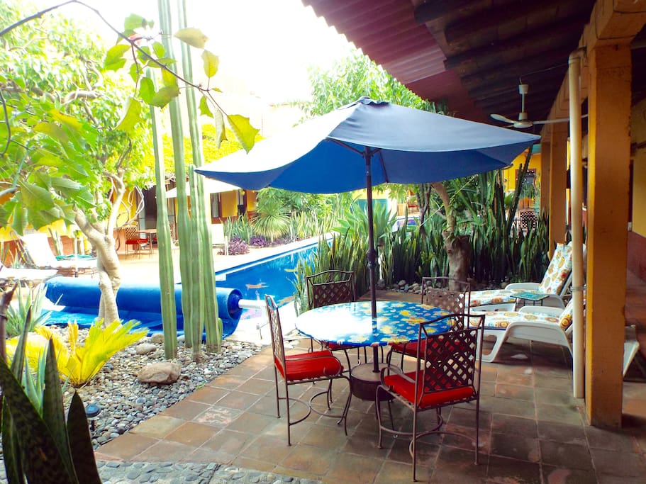 Private poolside patio has table, 4 chairs and two chaise lounges. Gets morning sun.
