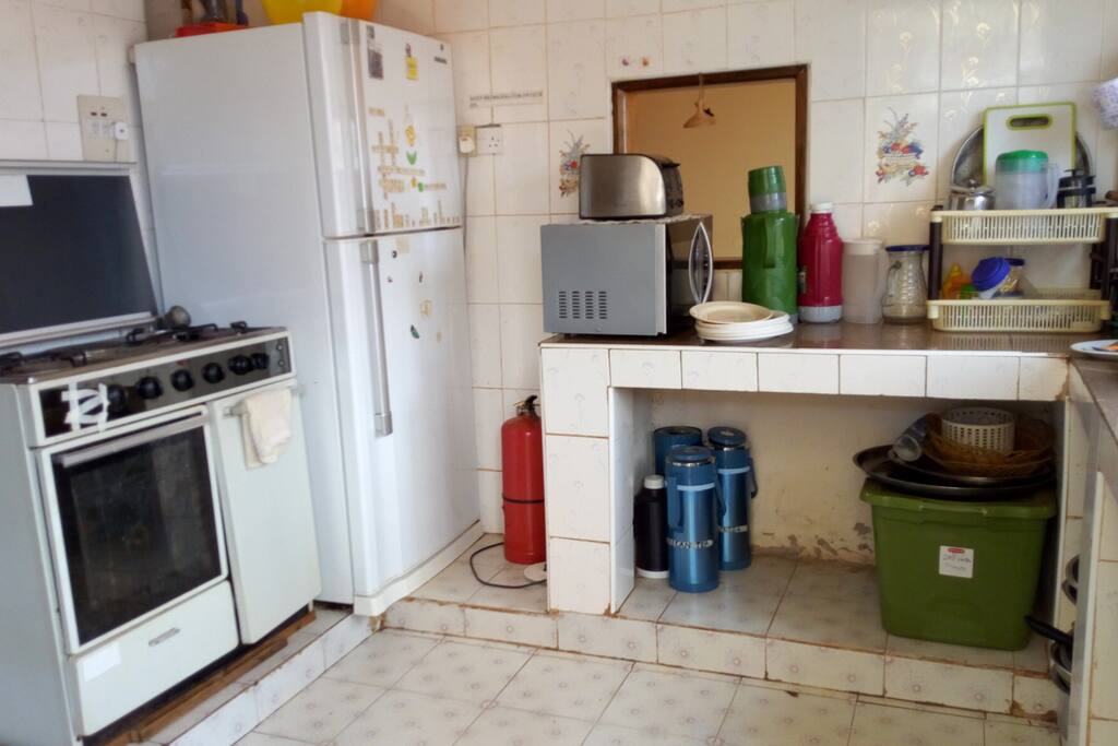 The kitchen is equipped with a refrigerator, gas and electric cooker, microwave and essential utensils for large groups up to 50.