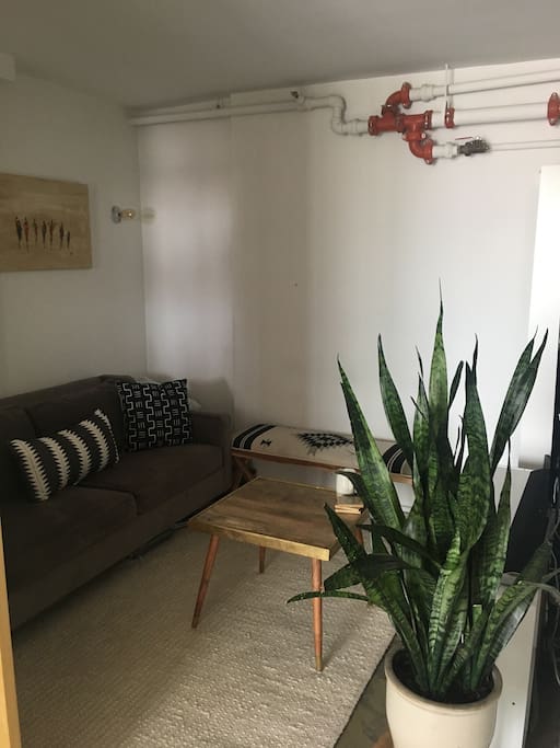 Cozy living room equipped with a 70' TV, cable, Apple TV and wifi equipped