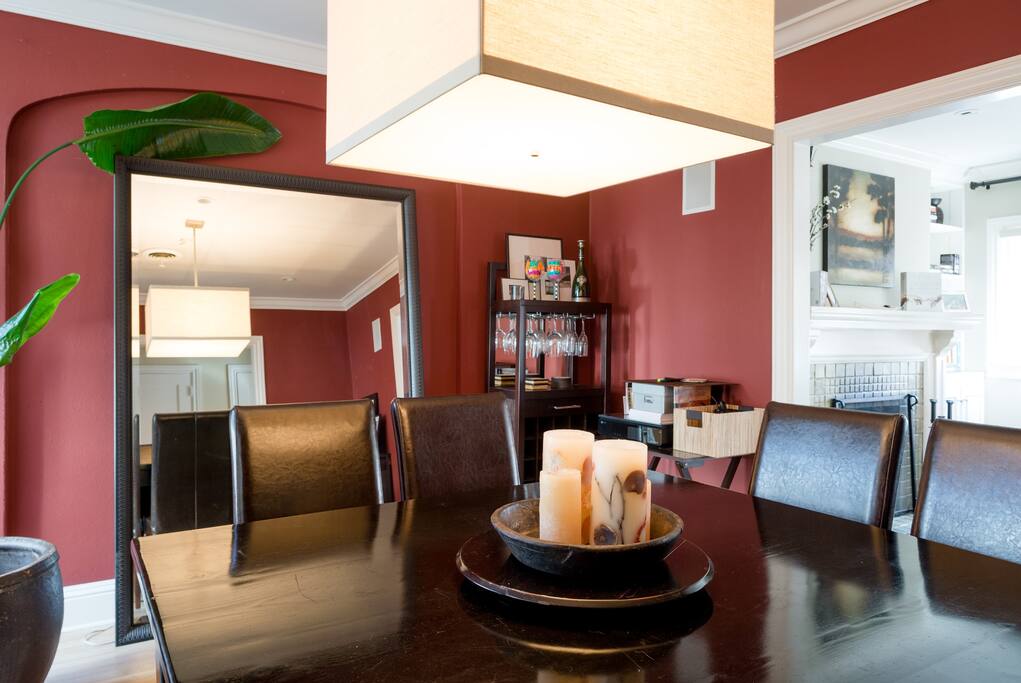 Large square dining room table which seats 8.
