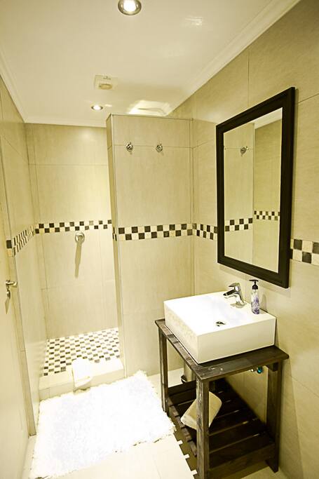 On-suite bathroom with shower, toilet and hand wash basin
