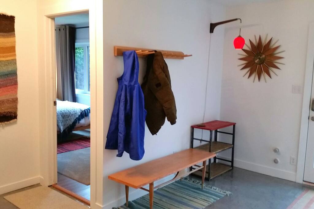 Here's your entrance and mudroom. All the doors in the house have coded locks so there's no fumbling with or sharing keys. Plenty of space to put skis, bikes and stuff.