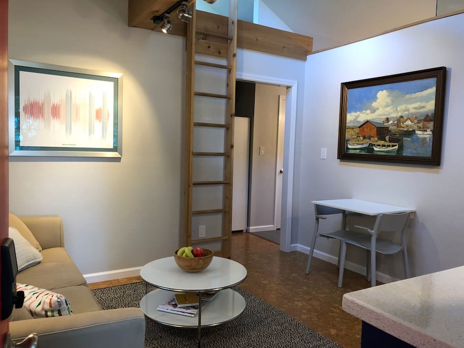 The living space is perfect for two with art spanning the centuries and countries. The piece on the left is from San Francisco and the one on the right is from Denmark.