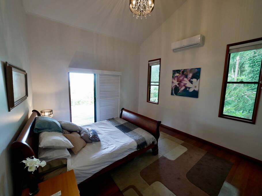 Main bedroom looking on to back decking (there are blinds for privacy)