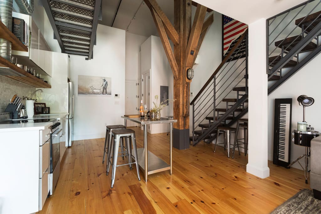 The kitchen and dining area bathed in light.
