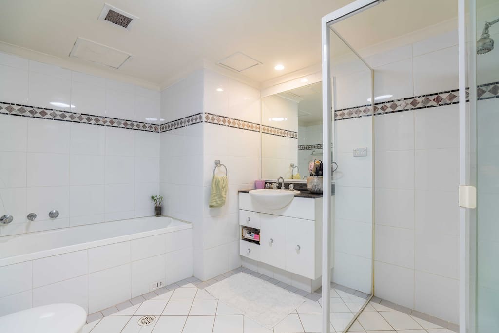 Main bedroom ensuite with bath, shower and toilet