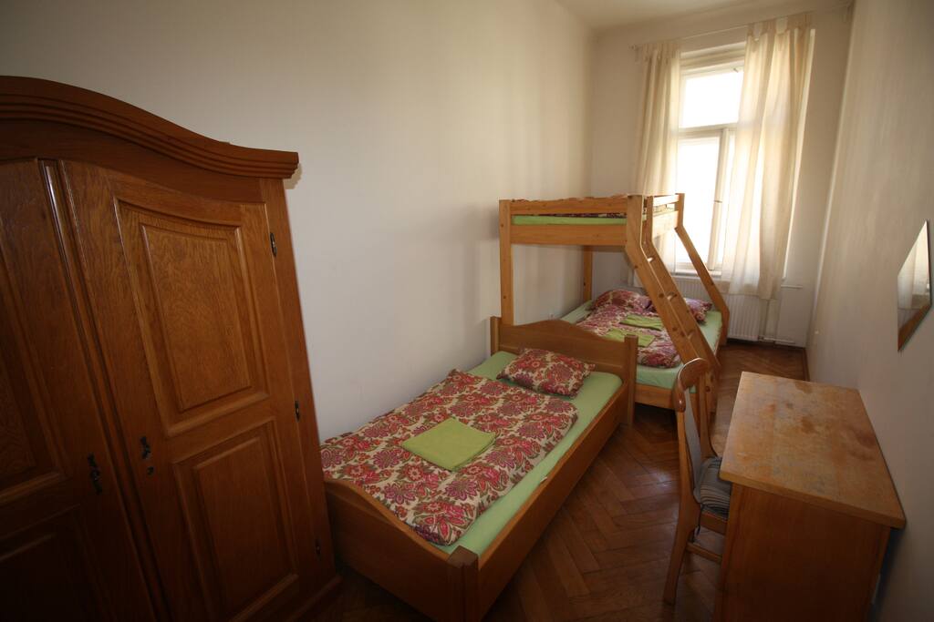 YOUR PRIVATE BEDROOM 1A arranged for 4 persons, writing desk chair, wardrobe