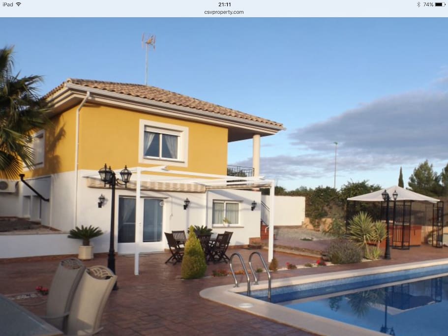 Private Garden, large pool, sun terraces and hot tub.