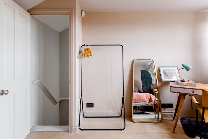 Chill in the Sleek Teal and Marble Kitchen at a Period Pad gallery image 5