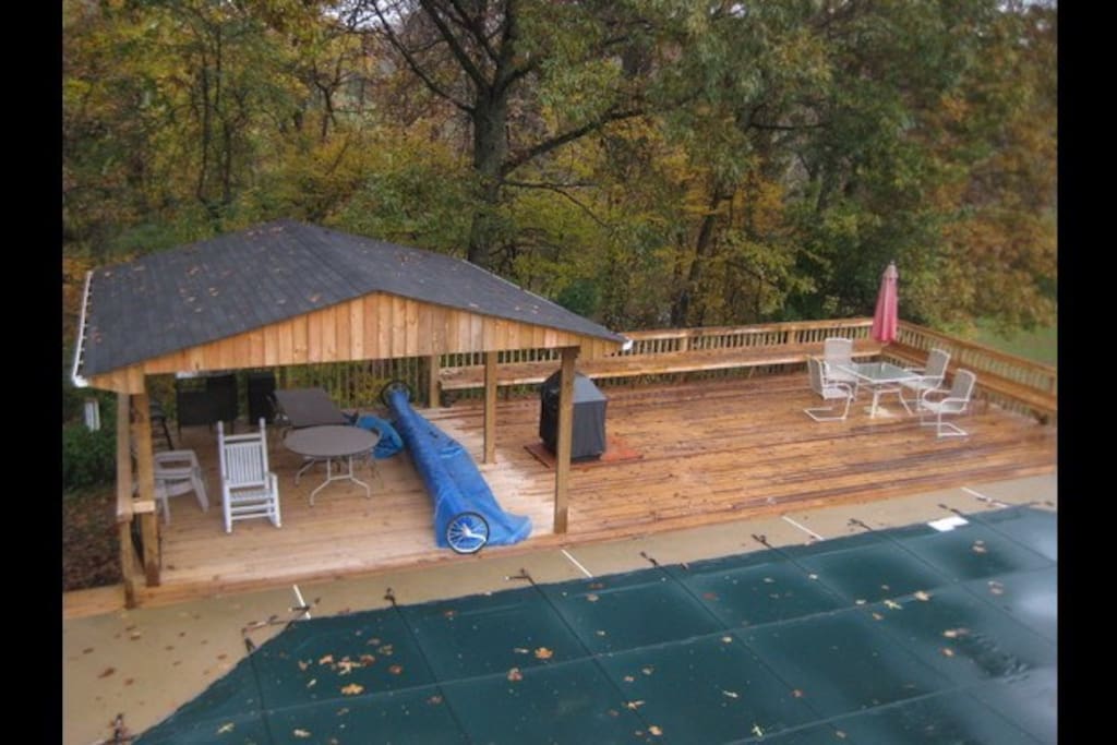 Large deck by pool.