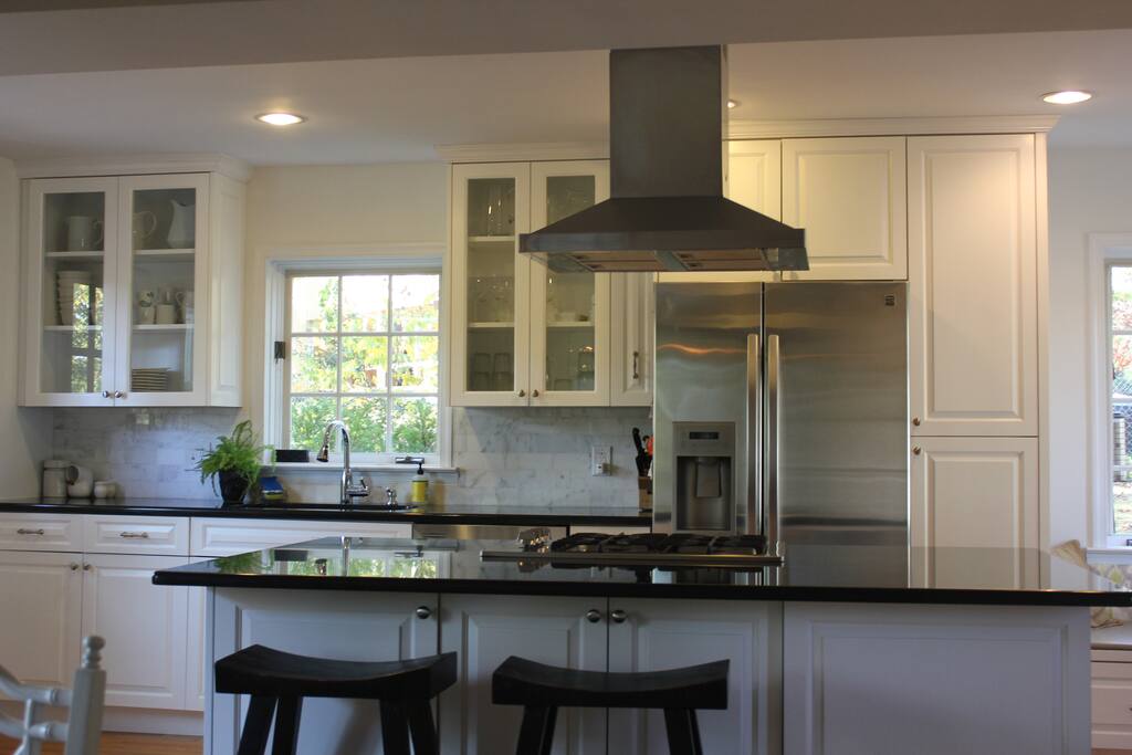 Well-appointed kitchen with all appliances, pots, etc.