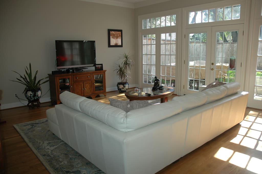 Bright, with lots of windows and french doors that open to the patio