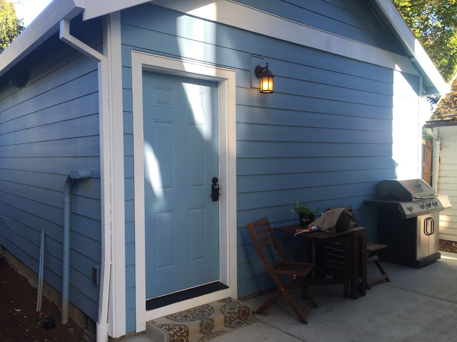 Brand new tiny house features patio and infrared grill for guests to use during their stay!