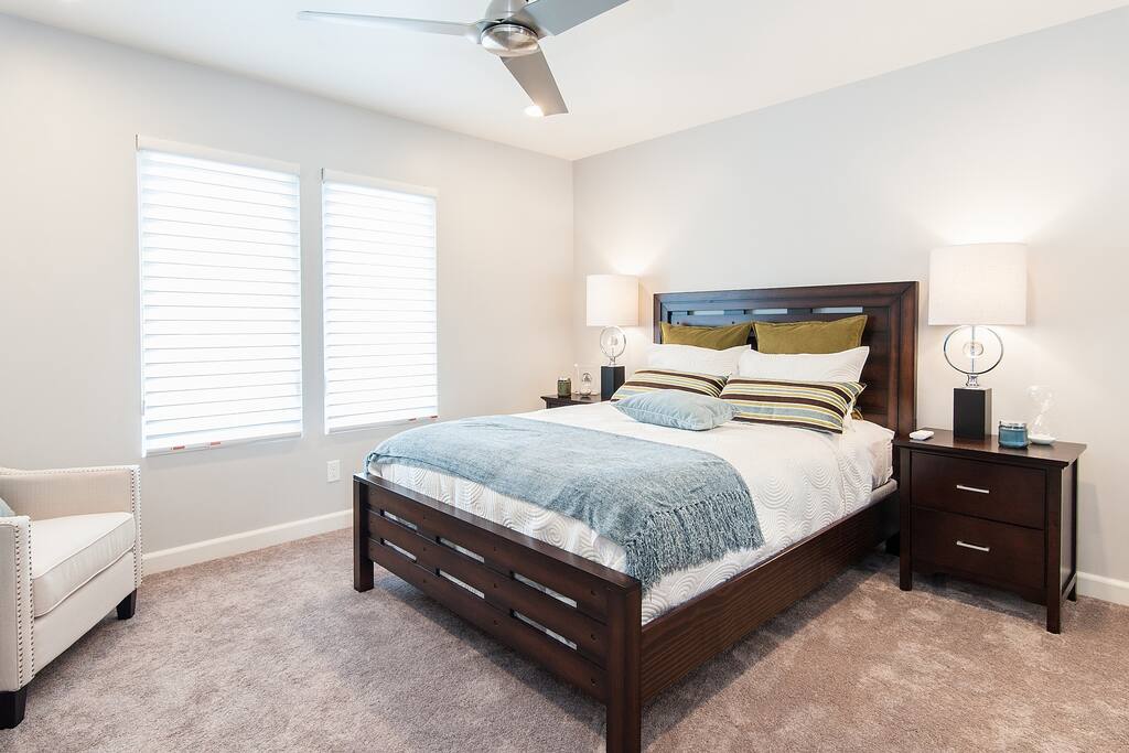 Front Queen Bedroom, reading chair, bed side tables, closet, remote controlled ceiling fan, dresser, TV. Whole House has Quiet A/C and NEST Smart Thermostat!