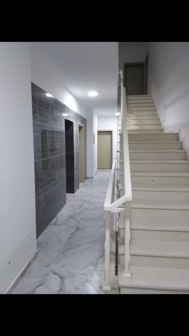 Marble entrance with lift area