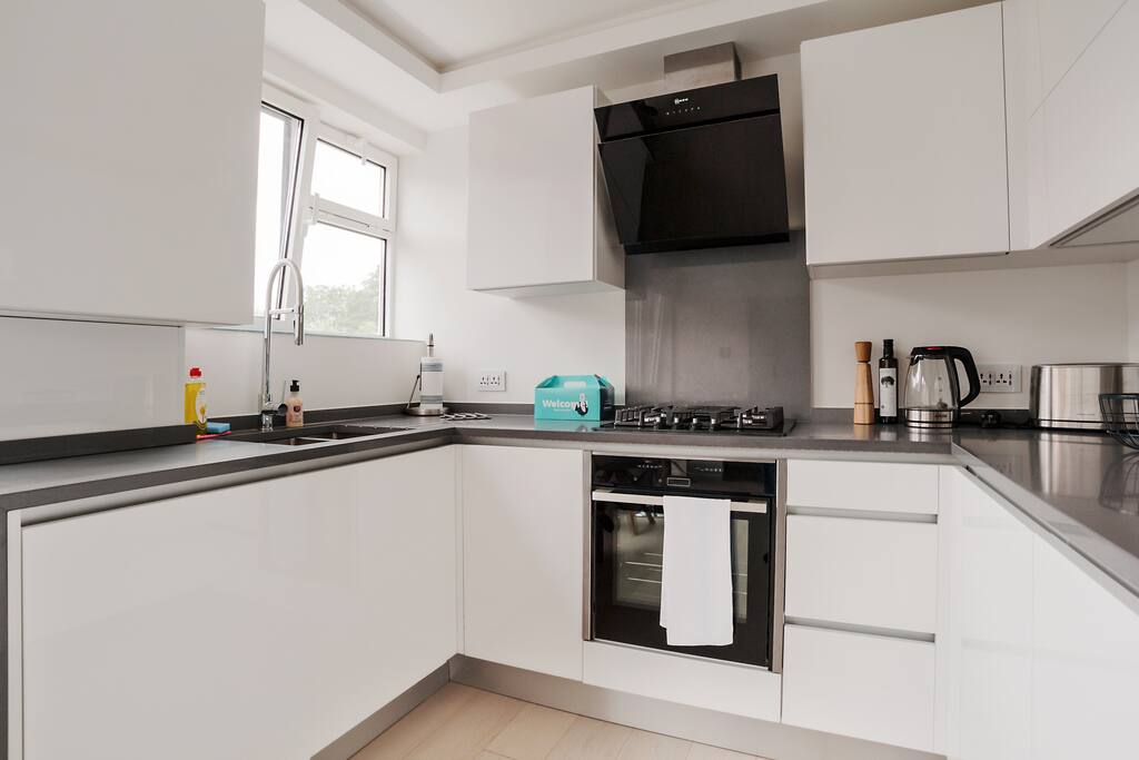 Cutting-edge appliances and sleek counter.