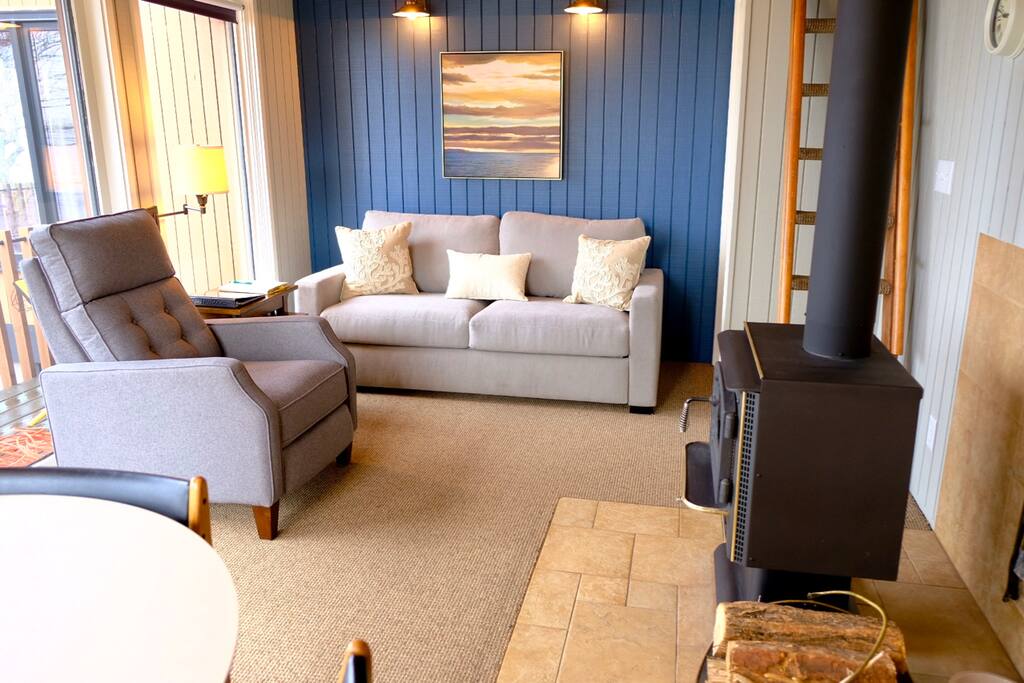 Living Room with a fireplace and a view