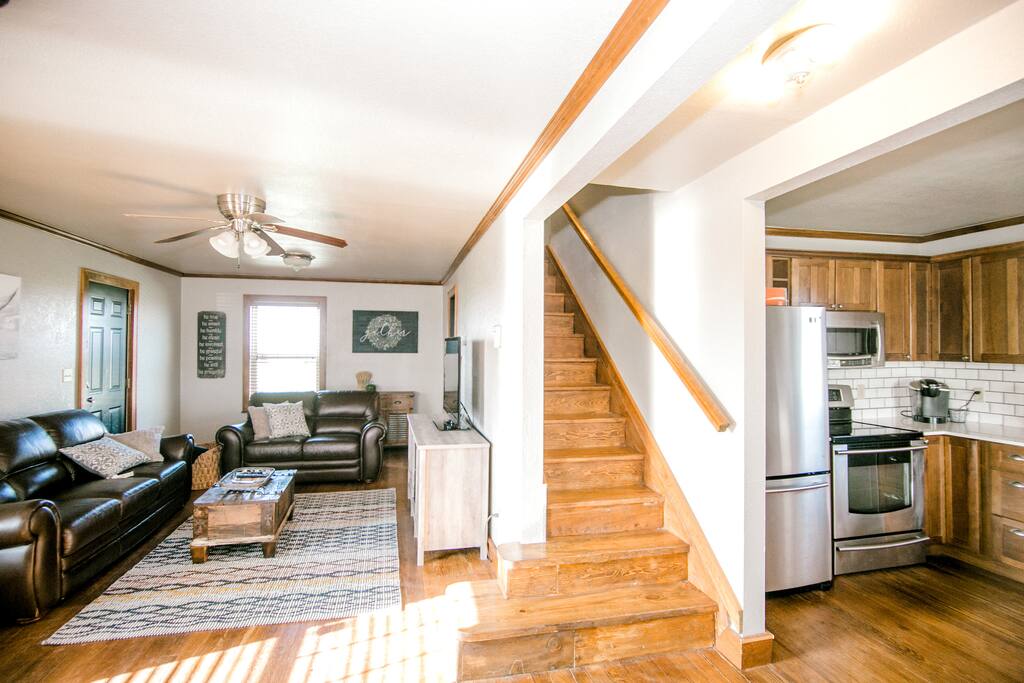 Enter into the living room, dining and kitchen.