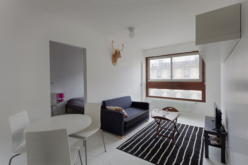 Living room (The sofa has been replaced by a real sofa which turns into a comfortable double bed)