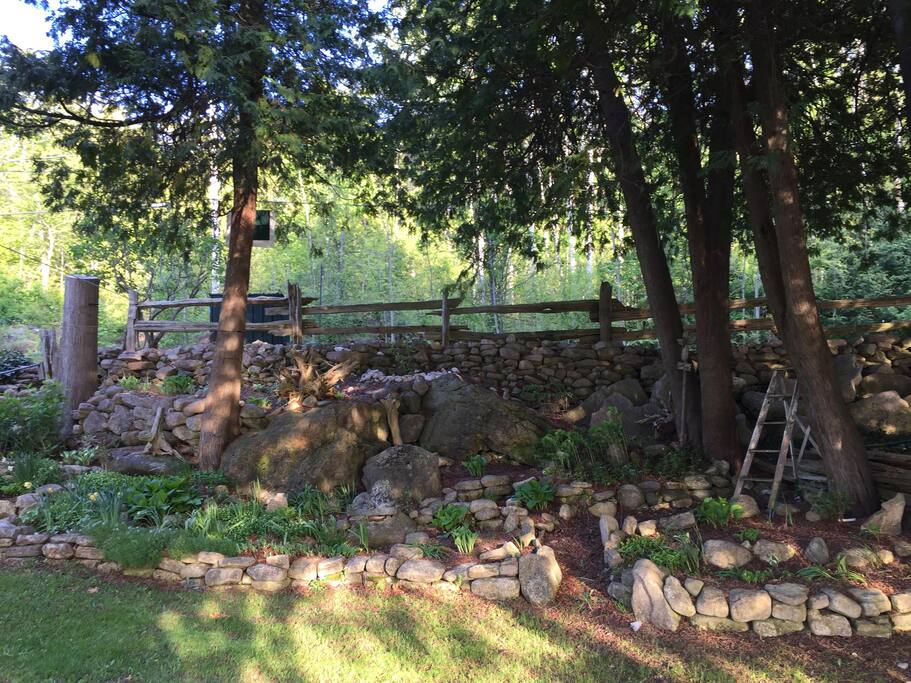 The property is on a double lot, which provides lots of space to enjoy. This is the garden beside the main cottage, with the road behind.