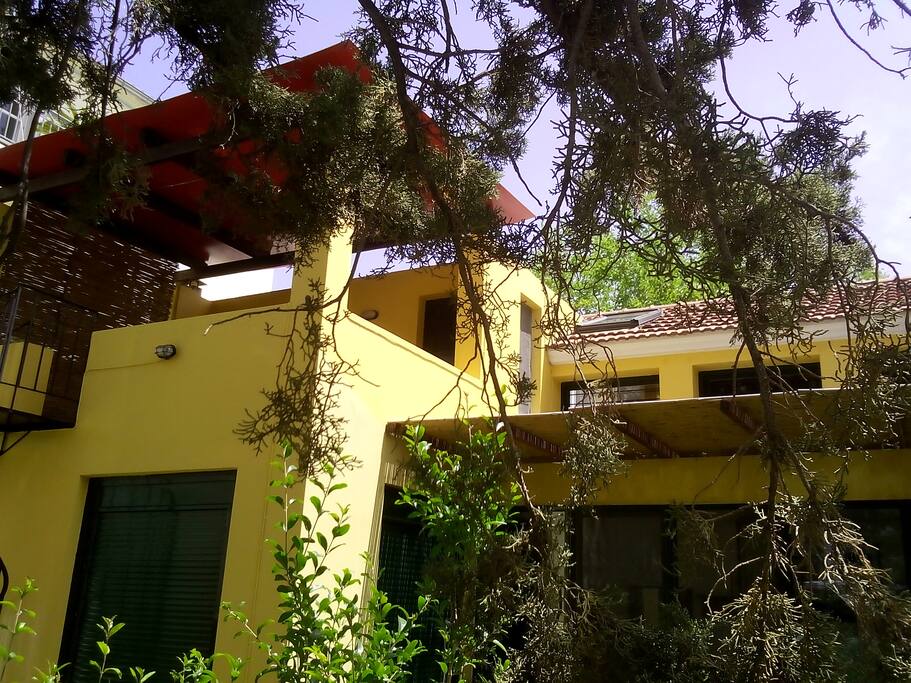 View of the terrace of the attic from the garden.