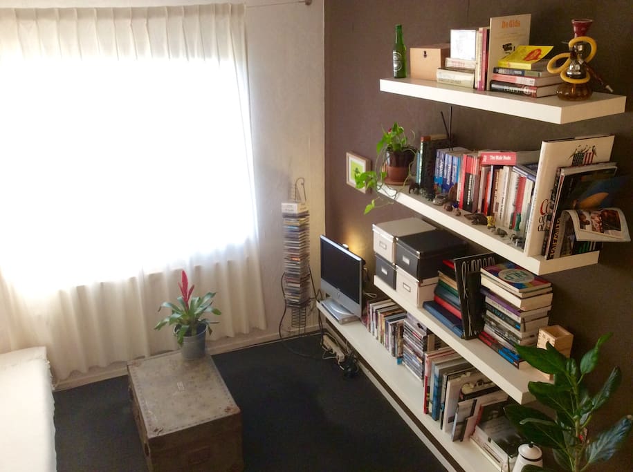 My room with cable television and lots of sunlight.