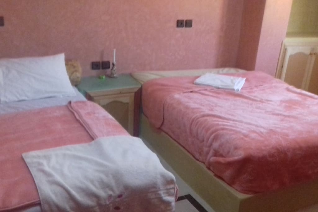 Tow double beds& bedroom and shower