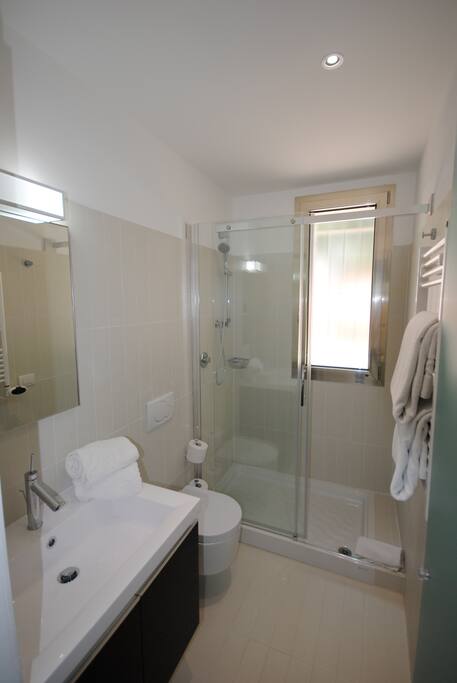 Bathroom with towels, shampoo ect...