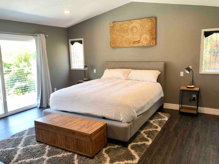 Master Bedroom #3 includes a Cal King bed with access to the balcony.