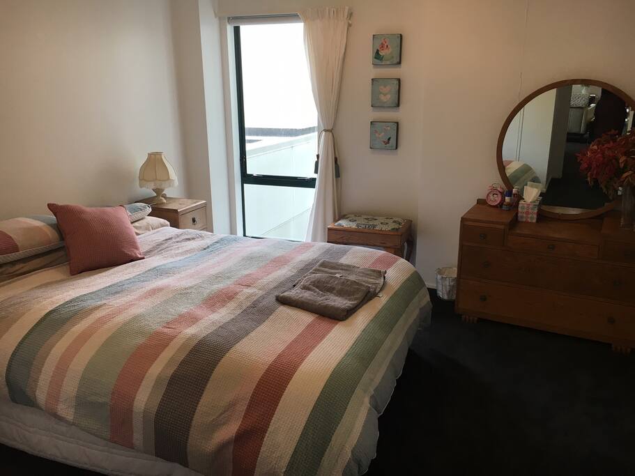 Main bedroom with a queen