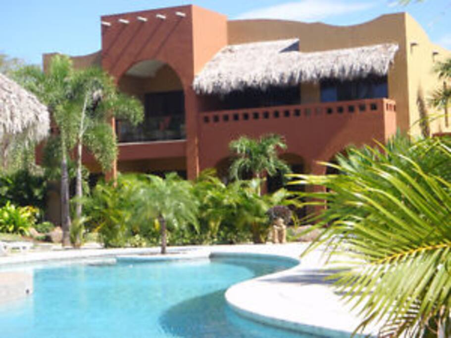 Top Condo overlooking the salt water pool