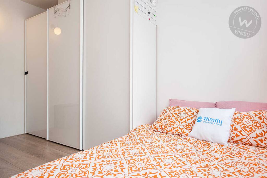 Bedroom at the front of the apartment facing the street.