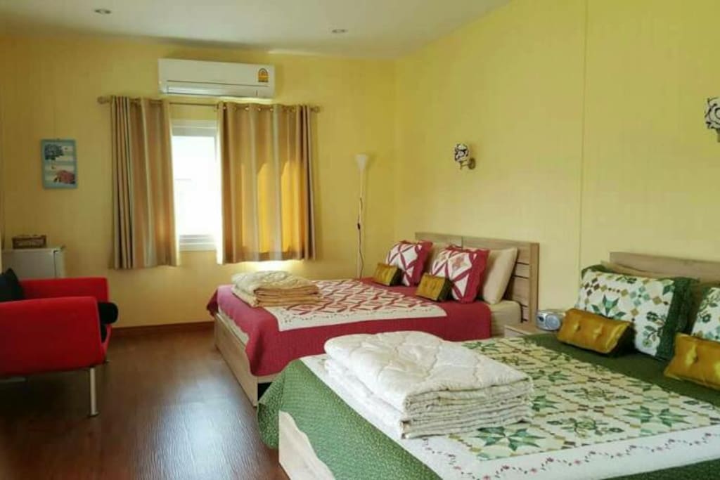 room with 2 beds & bathroom