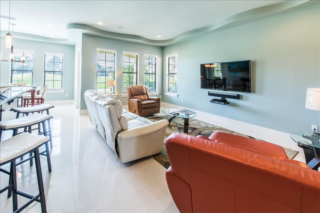 Living Room with Wall Mounted Flat Screen